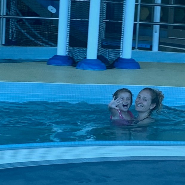 Mom and daughter at indoor pool