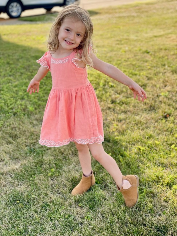 Young girl wearing Janie and Jack dress