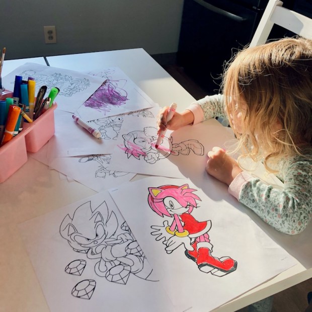 Girl coloring Sonic the Hedgehog coloring sheets