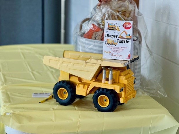 Diaper raffle construction truck at baby shower