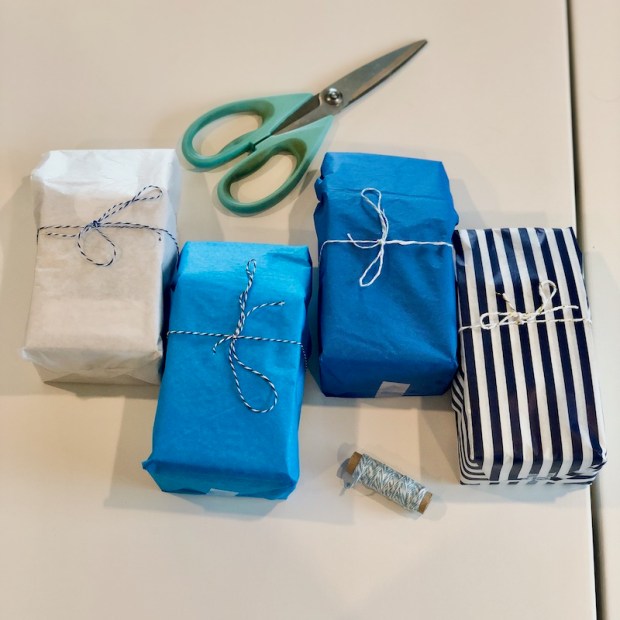 Granola packaged in blue tissue wrap for Etsy order