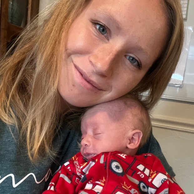 Mom holding four pound baby
