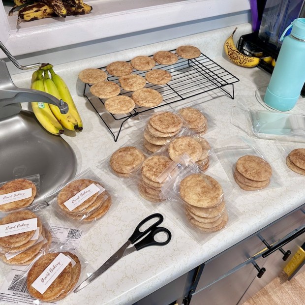 Snickerdoodle cookies being wrapped by Braid Bakery