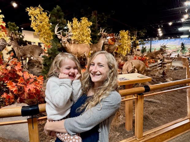 Mom and daughter near deer at Cabela's in Wheeling, WV