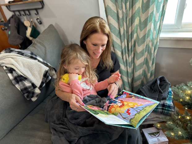 Grandma reading Emily Ley book to granddaughter