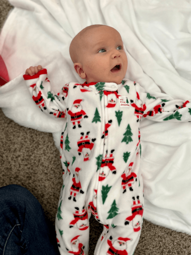 Baby boy in First Christmas sleeper