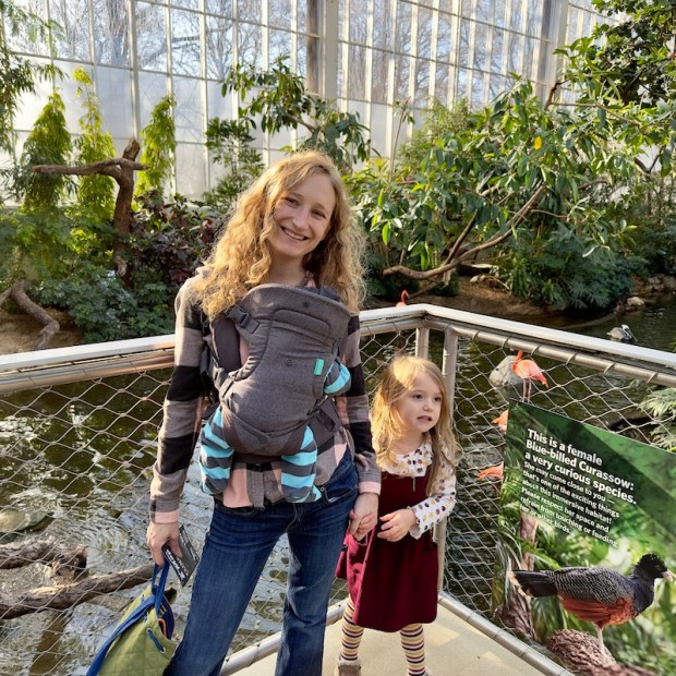 Mom with kids near flamingos at National Aviary