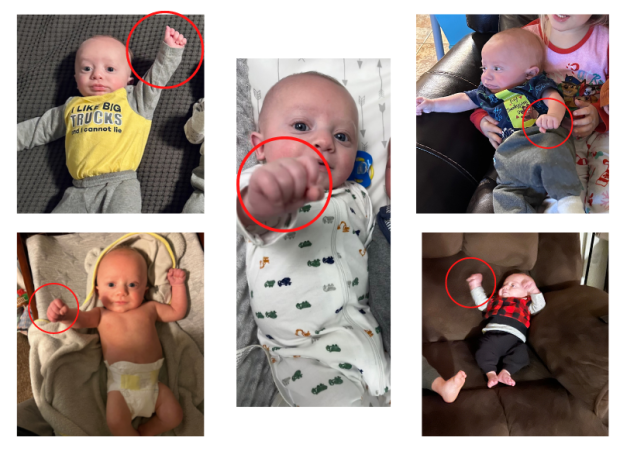 Baby boy doing the pound it hand motion or bro fist