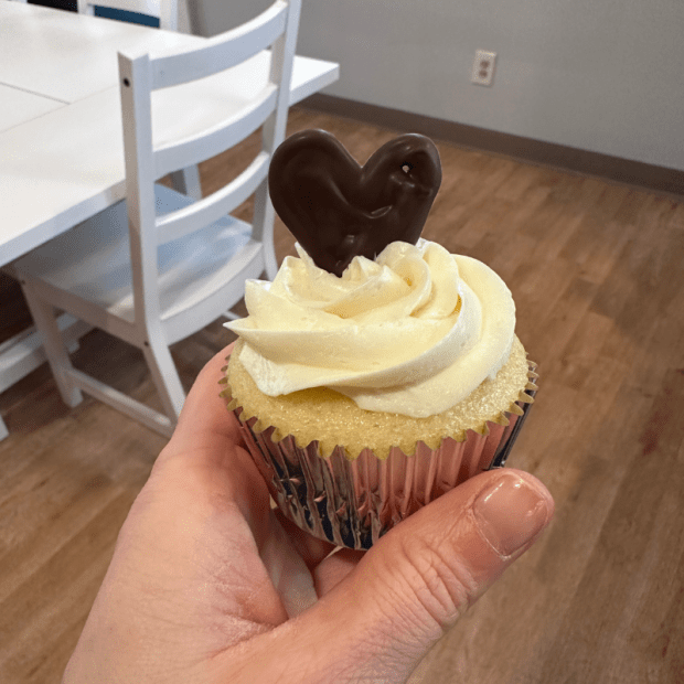 Vanilla cupcake with buttercream and chocolate heart