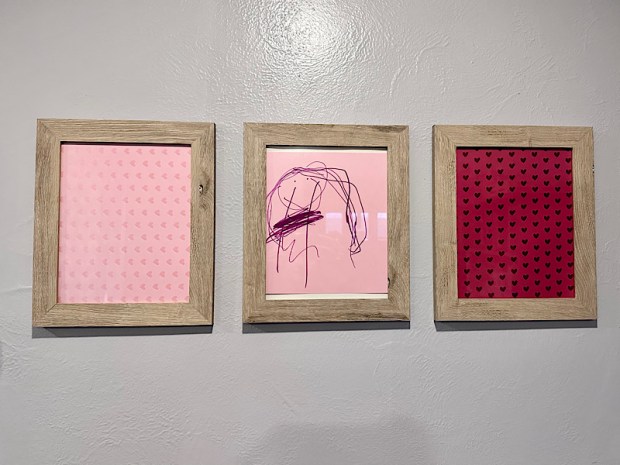 Valentine's Day art with scrapbook paper in frames