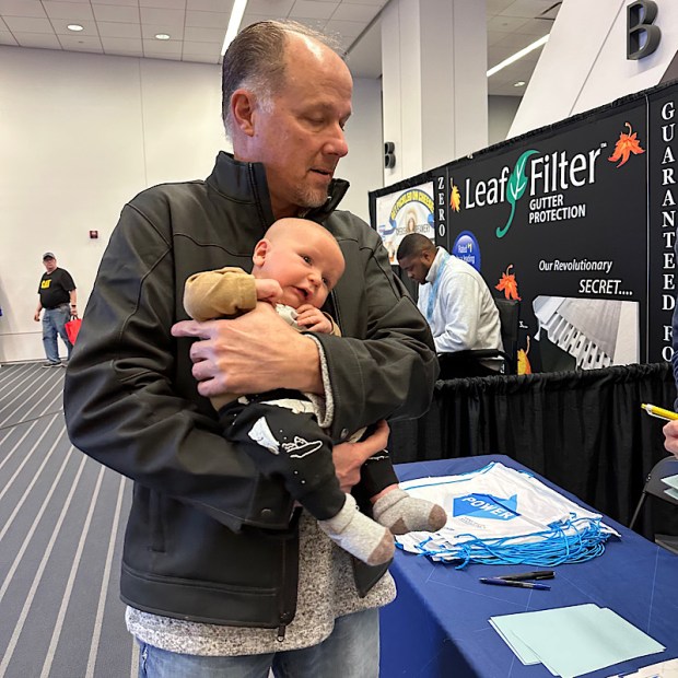 Fred holding Mordecai at RV Show