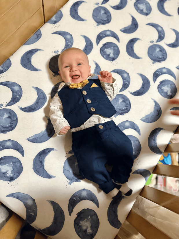 Baby boy wearing a suit with bow tie and pocket square