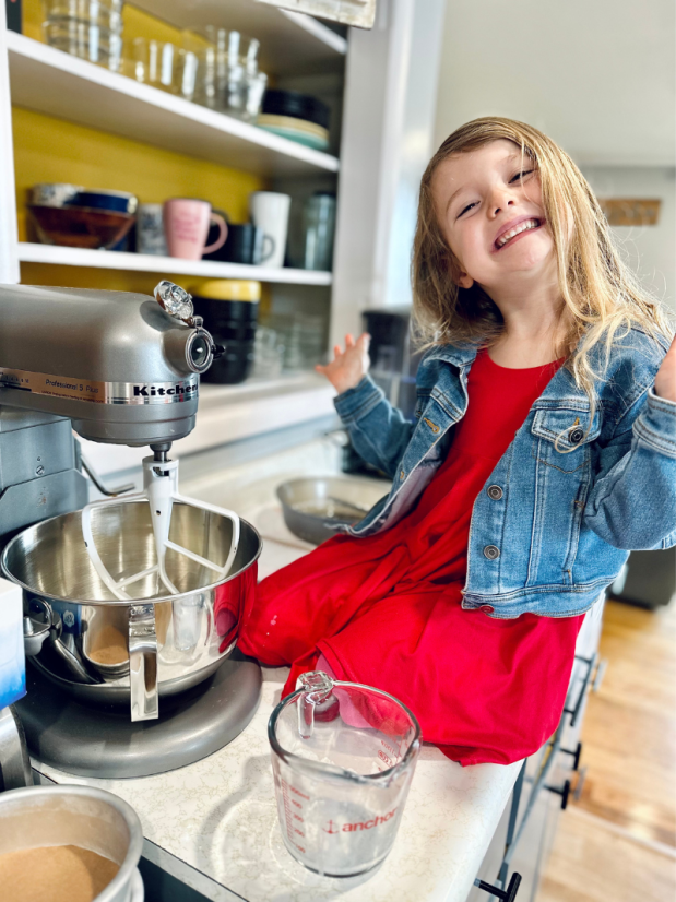 Girl sitting by mixer