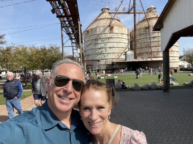 Husband and wife in front of Silos in Waco, TX