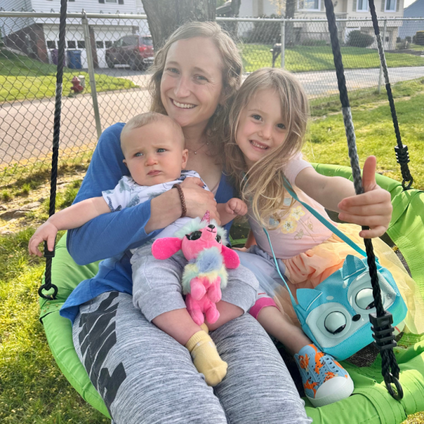 Mom and kids on swing