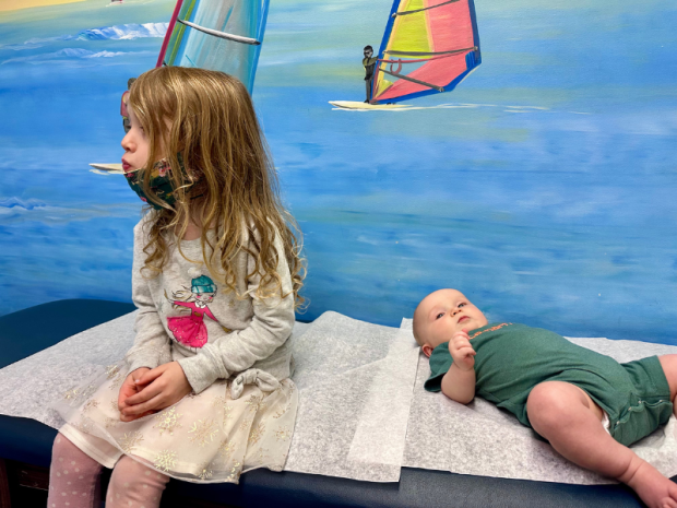 Brother and sister at doctor's office