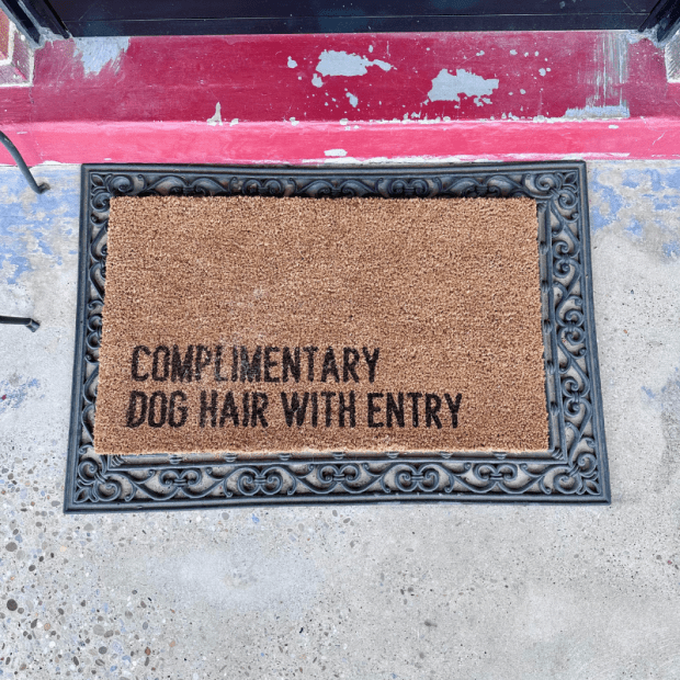 Door mat that says Complementary Dog Hair With Entry