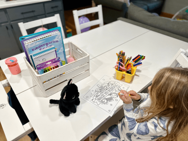Girl doing homeschool kindergarten
