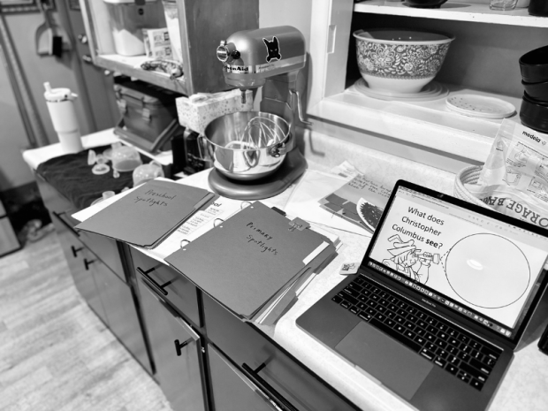 Lesson planning at kitchen counter