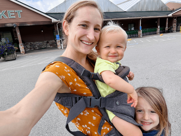 Mom with daughter and baby in carrier