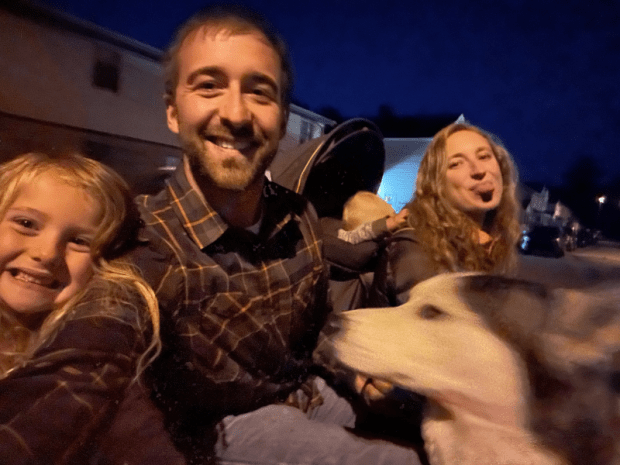 Family selfie with dog on hayride