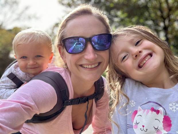Mom with baby on back and daughter