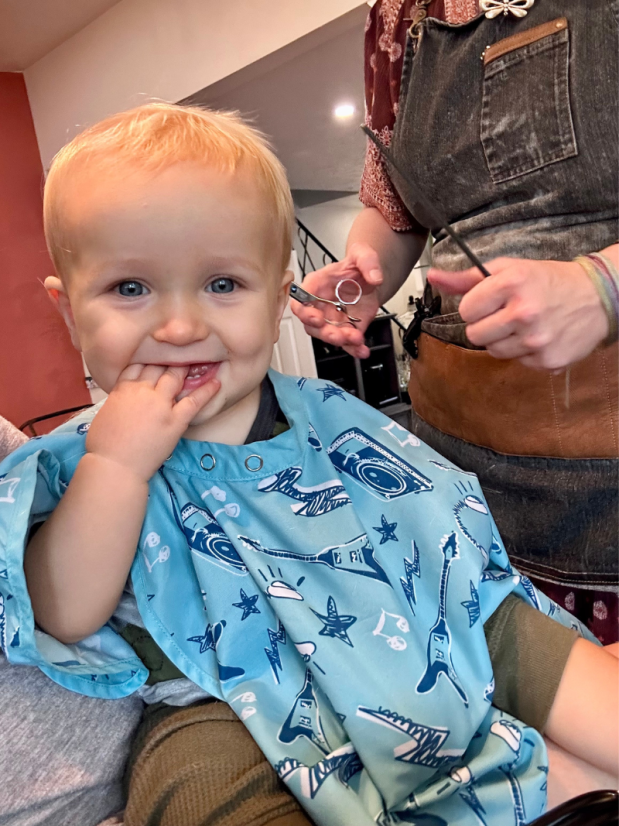 Baby boy getting first haircut