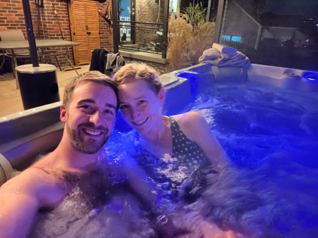 Husband and wife in hot tub together
