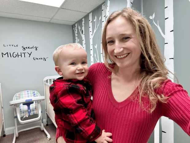 Mom with baby boy wearing red