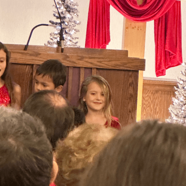 Girl singing at church