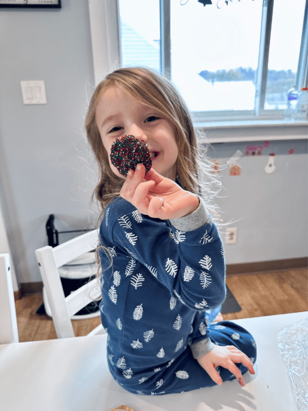 Girl with Christmas cookie