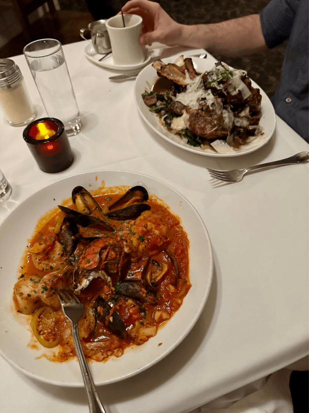 Alla Famigila Pittsburgh meal of seafood diavola and veal chops