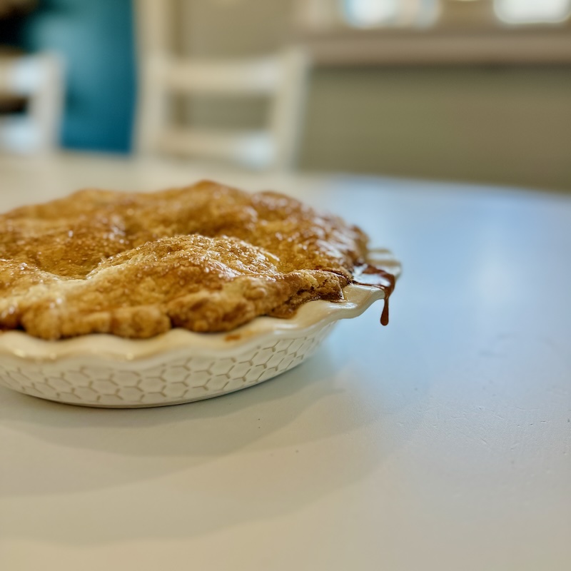 Apple pie on kitchen table