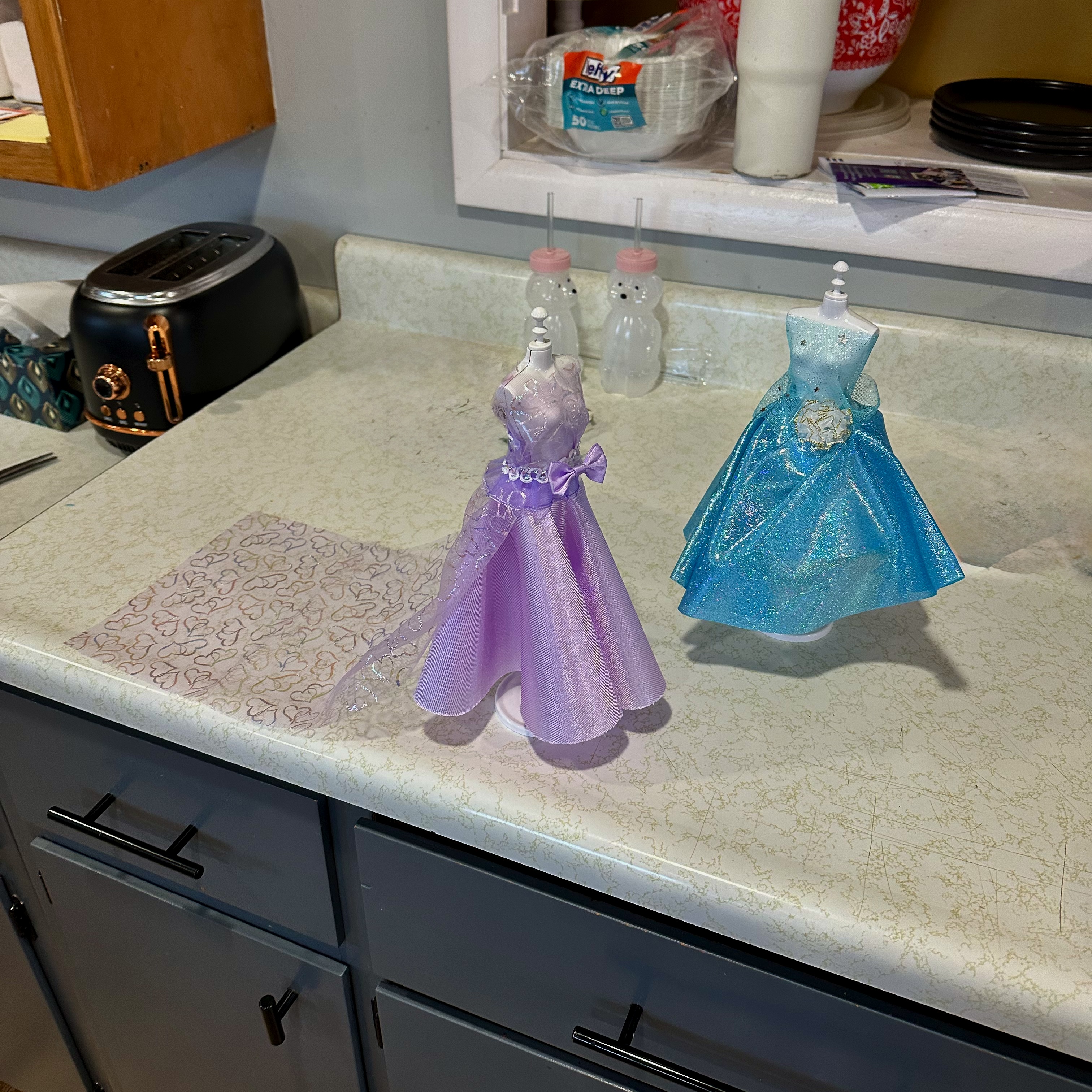 Dresses on toy mannequins