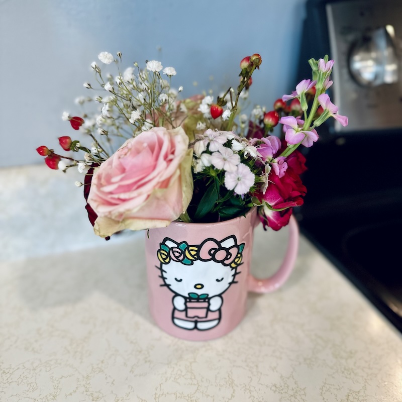 Hello Kitty mug with flowers