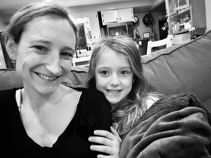 Mom and daughter selfie on couch