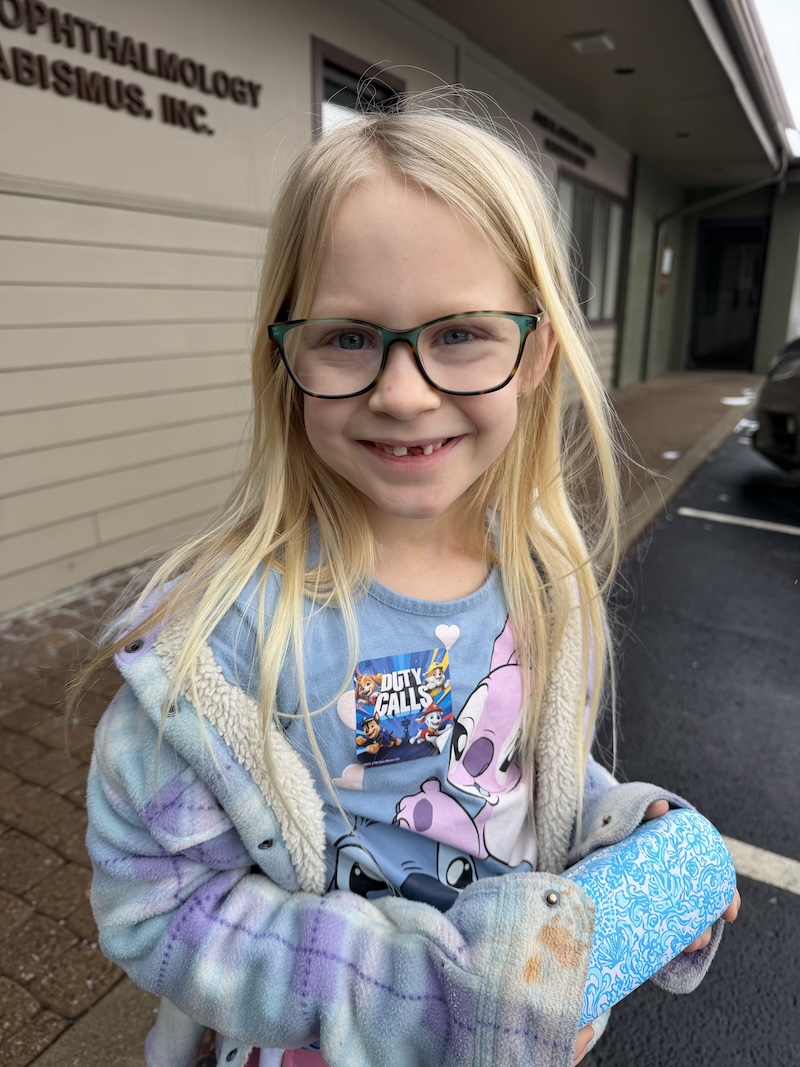 Six year old girl with glasses
