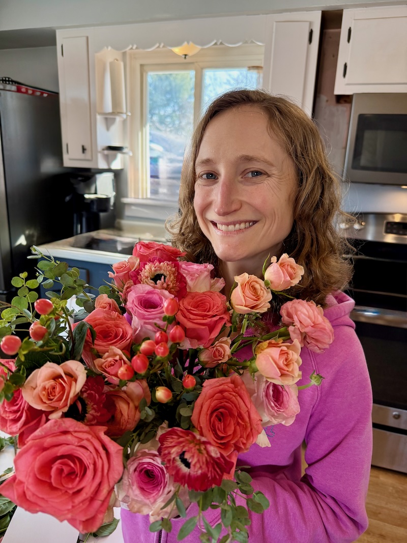 Girl holding flowers