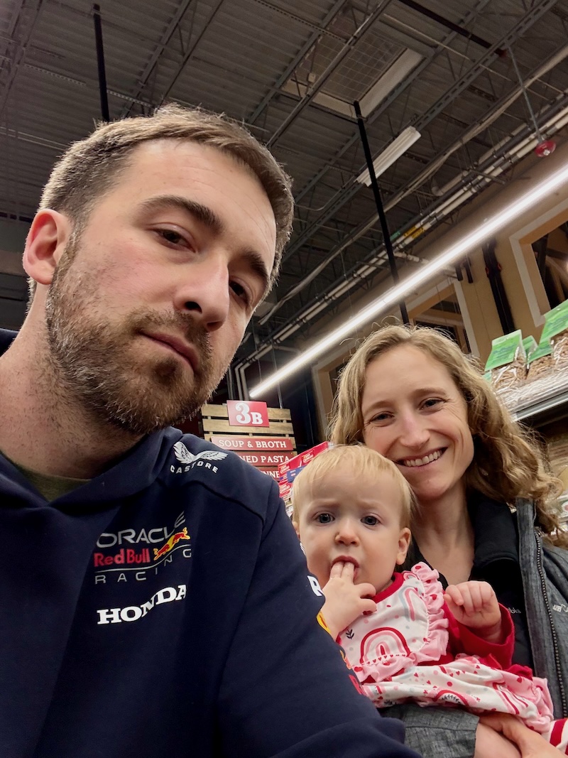 Mom, Dad, and baby in grocery store