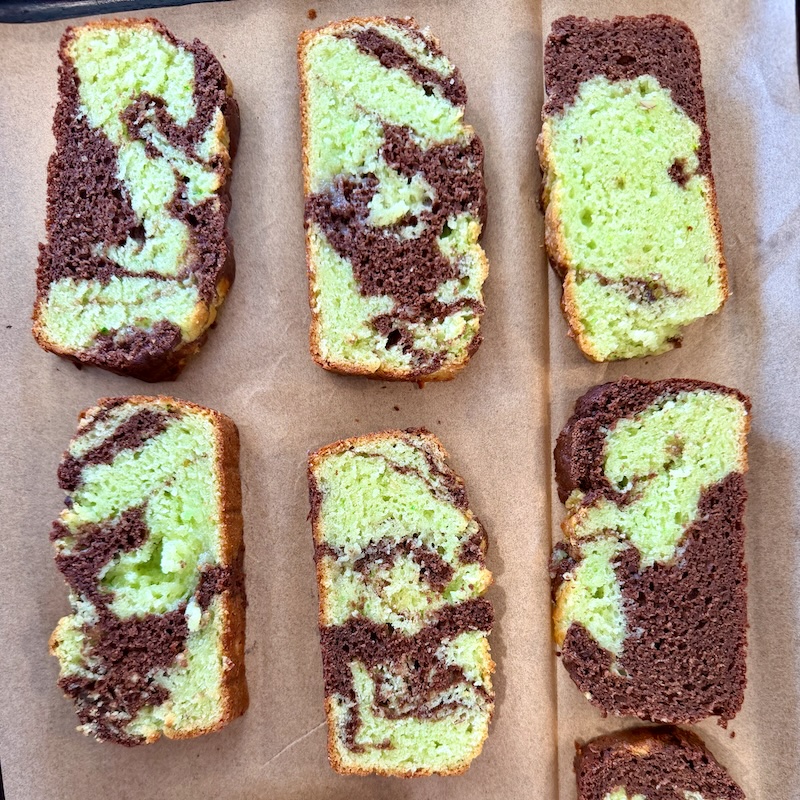 Chocolate pistachio swirl bread on baking sheet