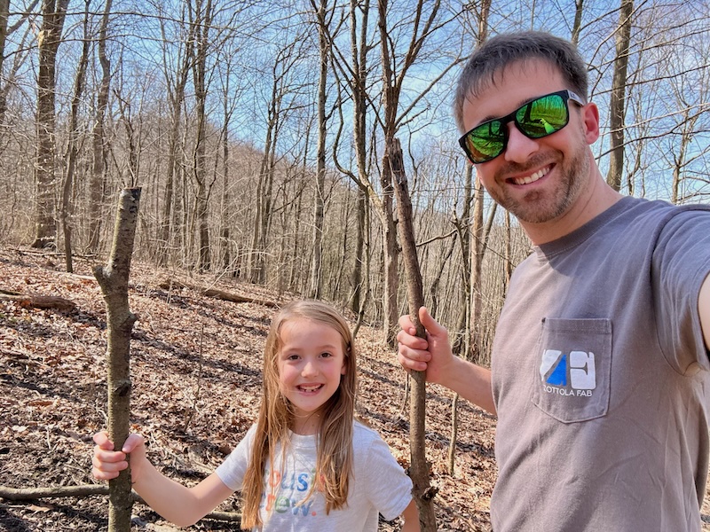 Dad and daughter hiking