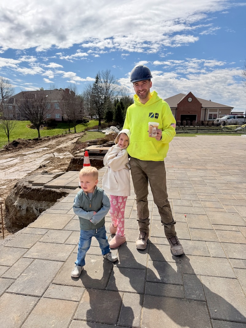 Dad with kids at job site