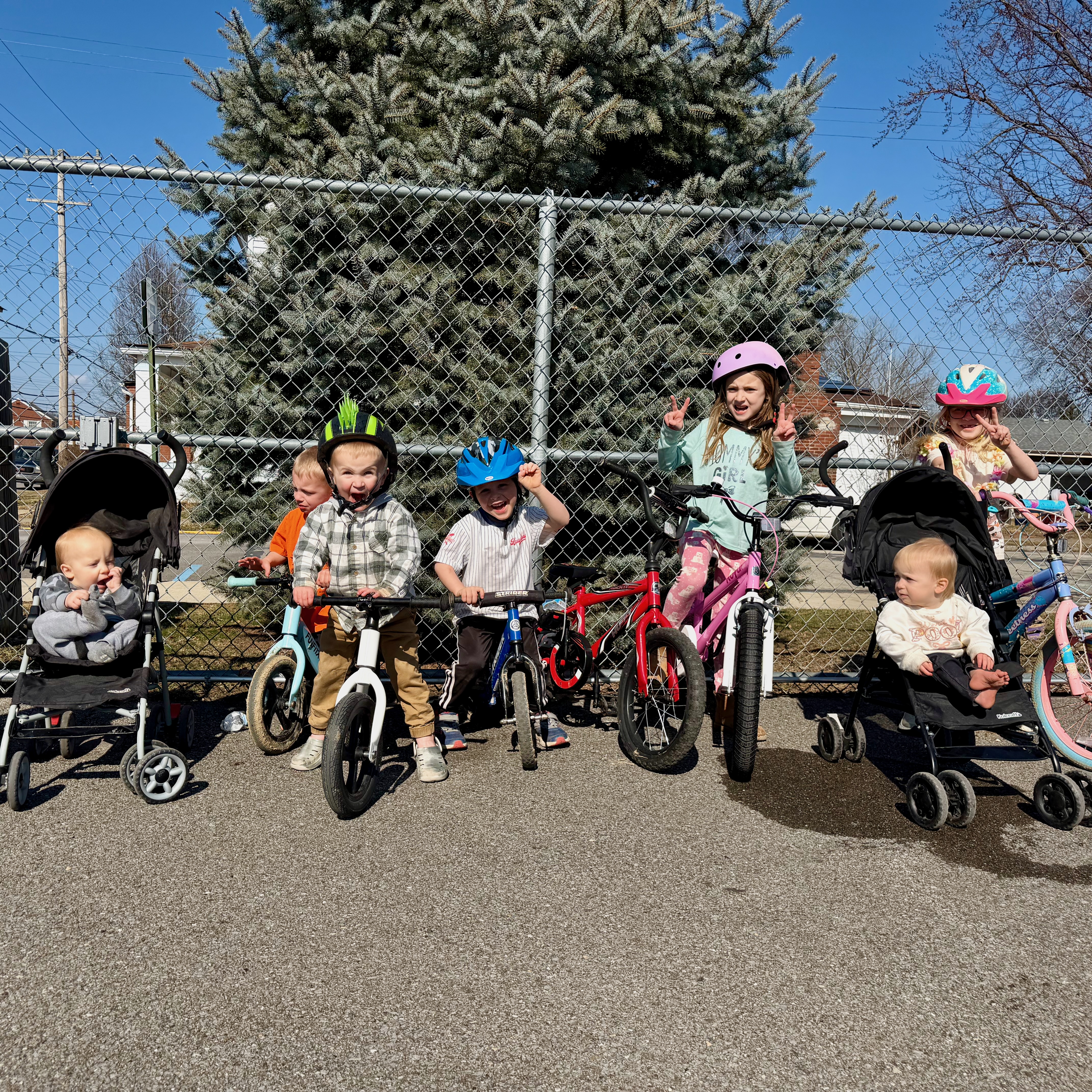 Kids on their bikes outside at a park