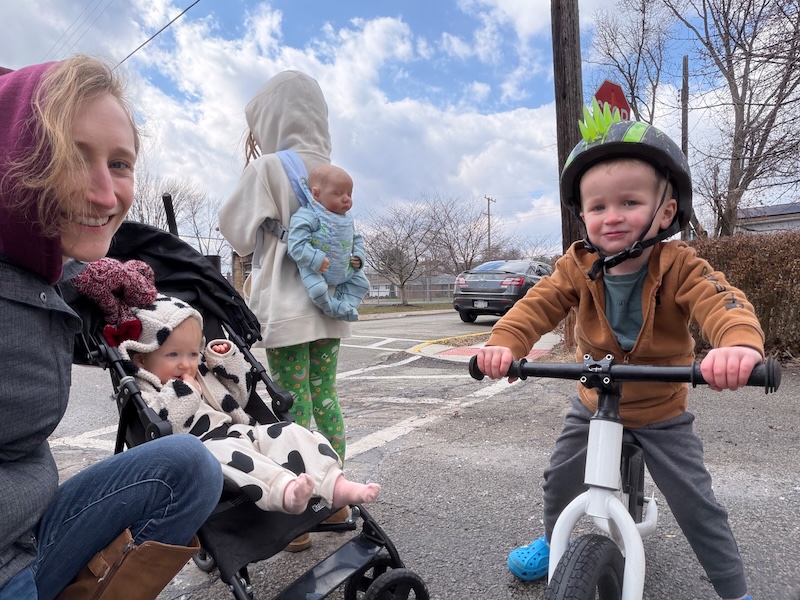 Mom outside on a walk with kids