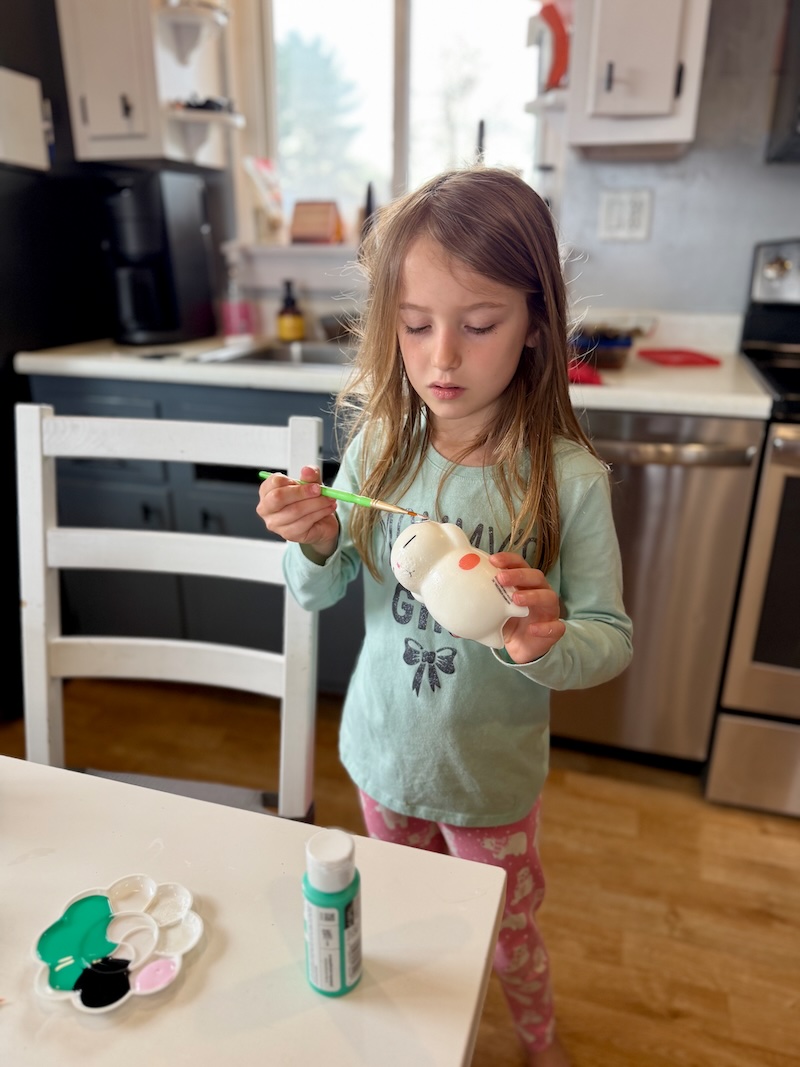 Girl painting a squishy toy