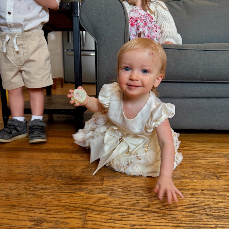 Baby girl in white dress