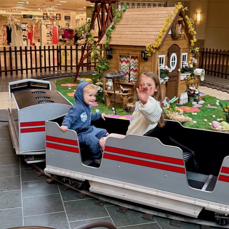 Kids riding Easter train at mall
