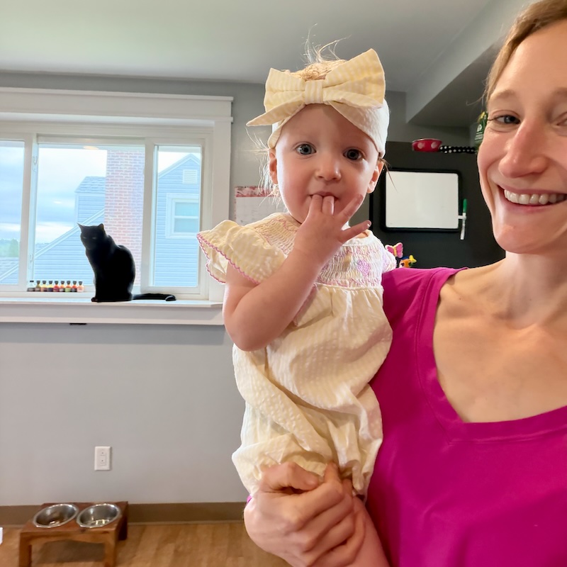 Mom holding 15 month old baby
