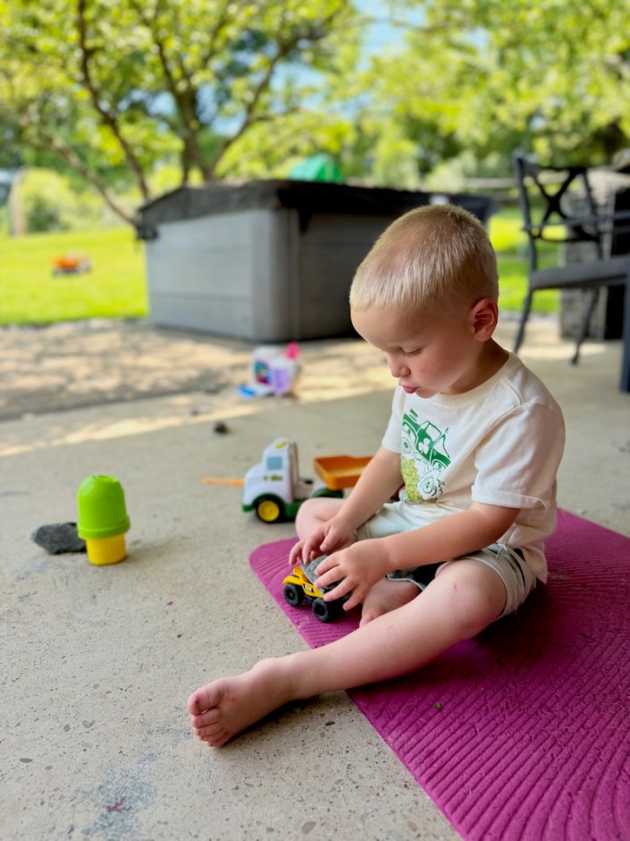 Mordecai playing with toys