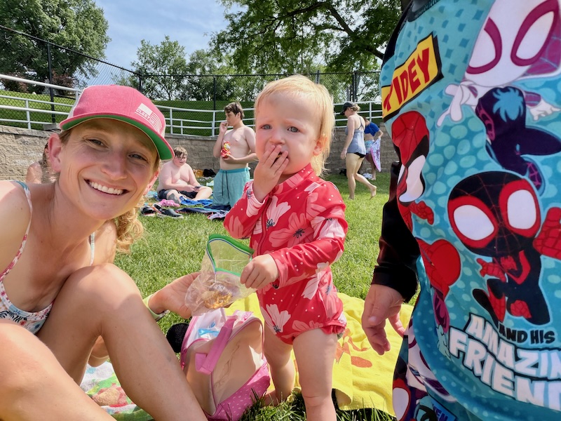Mom and toddler girl at pool